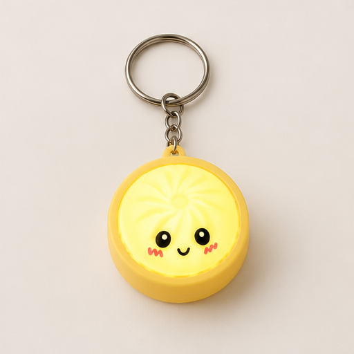 Bunwick – Touch-Sensing Glow Pressable Dumpling Fidget Keychain Yellow